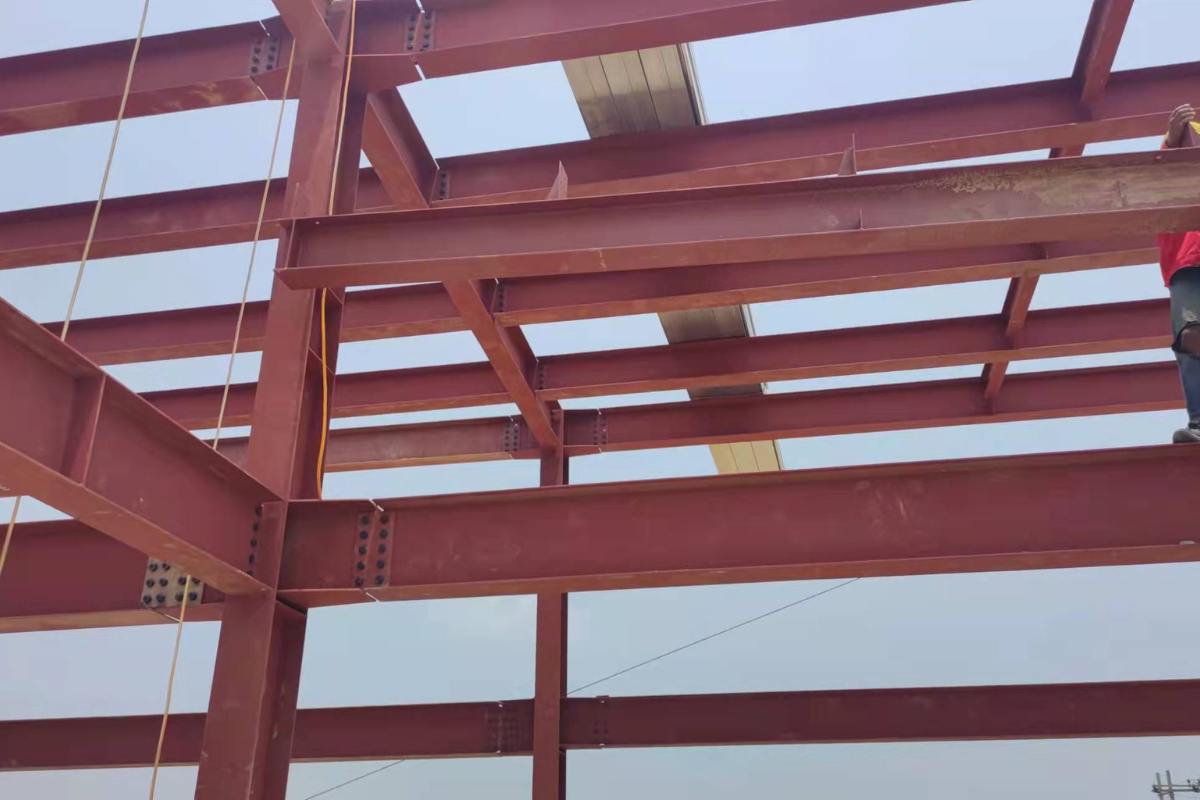 Close-up detail of bolted steel beam connections during the super structure work at Emerald E-Commerce Center in Naypyidaw, Myanmar