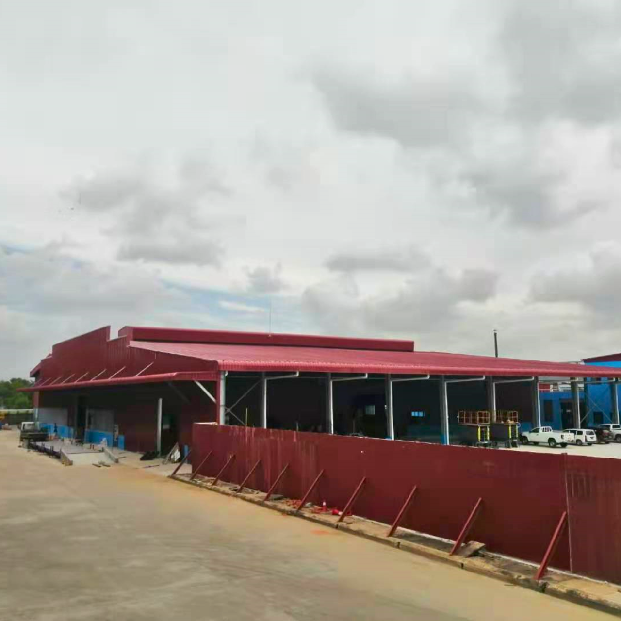 Finished steel structure warehouse completed by Myanmar Yi Jin at their project site in Yangon, Myanmar, showcasing the final results of their expert construction.