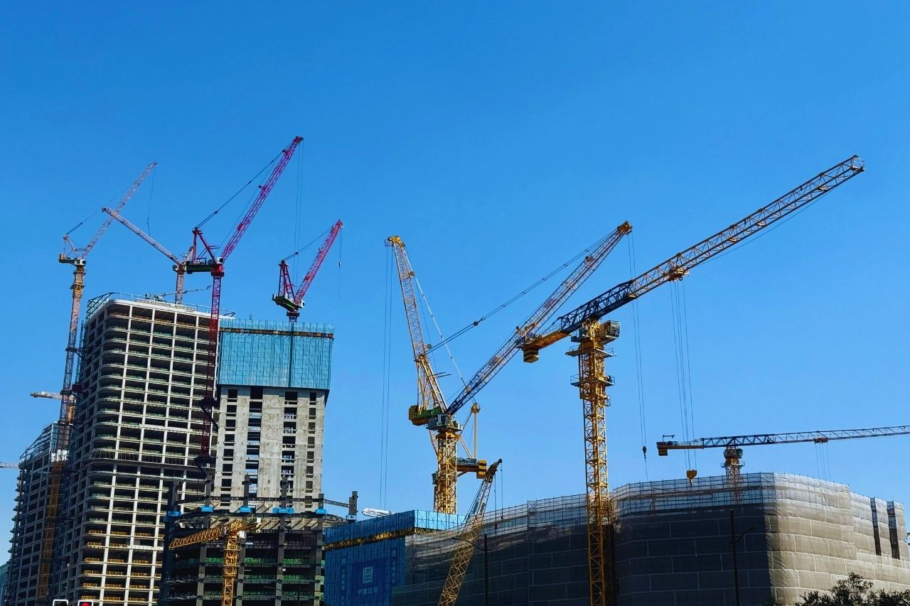 Aerial view of a three-storey industrial steel structure building with RCC foundation under construction by Myanmar Yi Jin in Myanmar