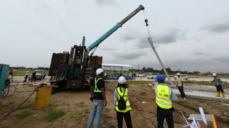 Engineers inspecting crane foundation operations for Sae Paing Development Co. Ltd 15.75m x 33.40m warehouse in Yangon
