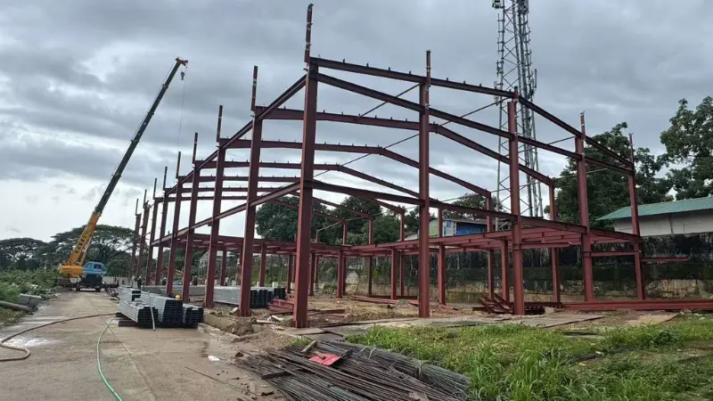 Steel structure erection and heavy crane operation for PAI Car Showroom and Workshop building in Yangon